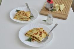 Рецепт - ЛЕНИВЫЕ ХАЧАПУРИ С СЫРОМ НА СКОВОРОДЕ - Шаг 10 -  Немного остудить и подавать, разделив на порции. Можно украсить зеленью.