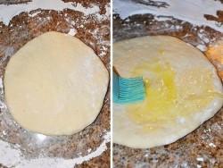 Рецепт - ХАЧАПУРИ НА МОЛОКЕ С СЫРОМ - Шаг 5 -  Переверните мешочек швом вниз и снова раскатайте в круг. Внутри лепешки будет воздух, его можно выпустить проколов хачапури в нескольких местах. Смажьте лепешку взбитым желтком